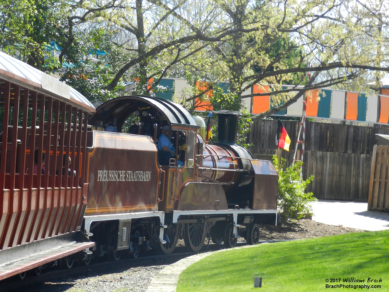 The conductor awaiting the "All Aboard" from the rear of the train at the Italy Station.