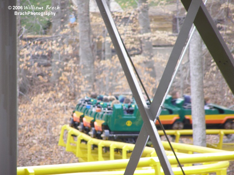 This train has just left the station and is making its way towards the lift hill.