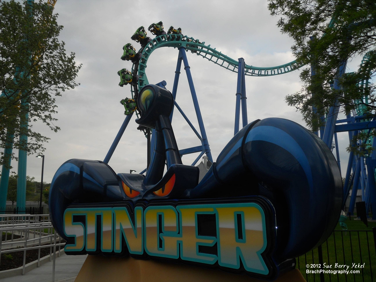 Stinger's entrance sign with the train in the cobra roll.