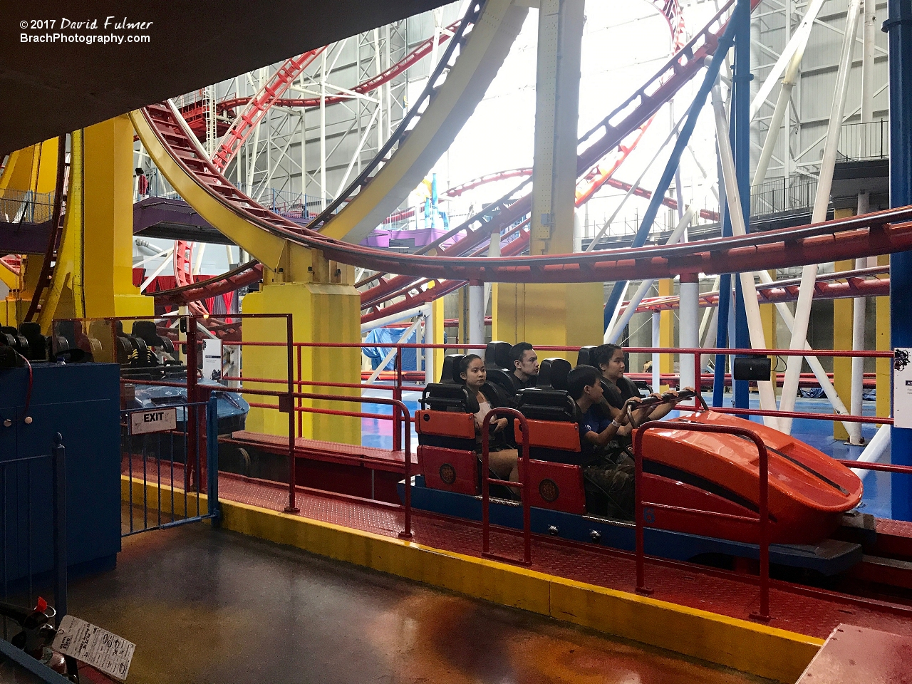 Mindbender cars loading up in the station.