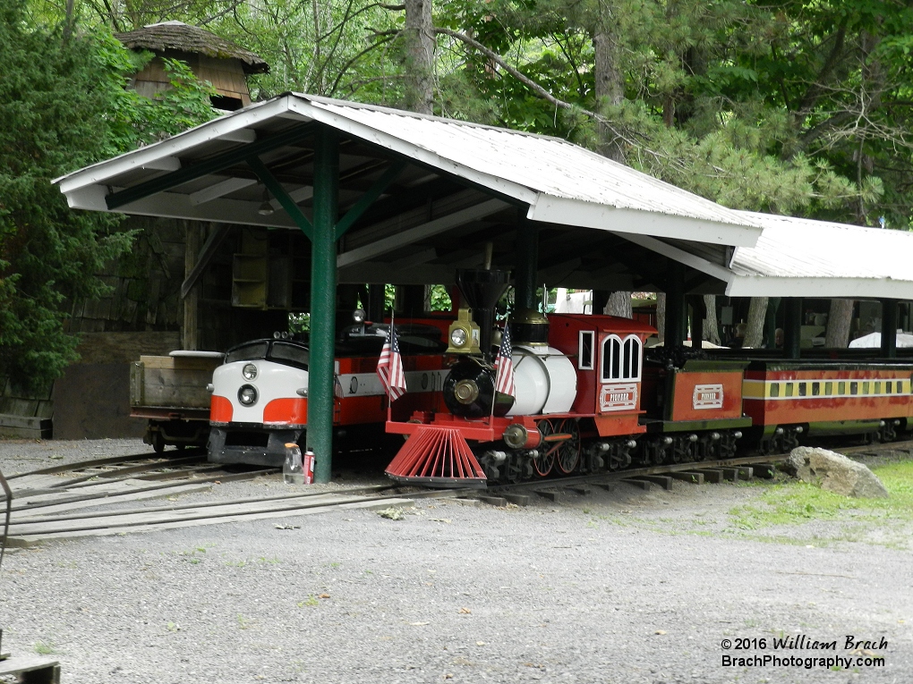 Trains being kept in storage for later in the day when they'll be needed to get the growds through the line faster.