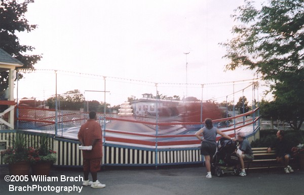 The Tilt-A-Whirl spinning riders.