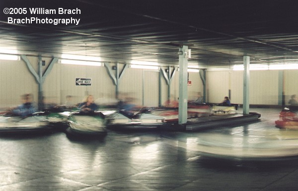 Here we see the Bumper Cars in motion at night.