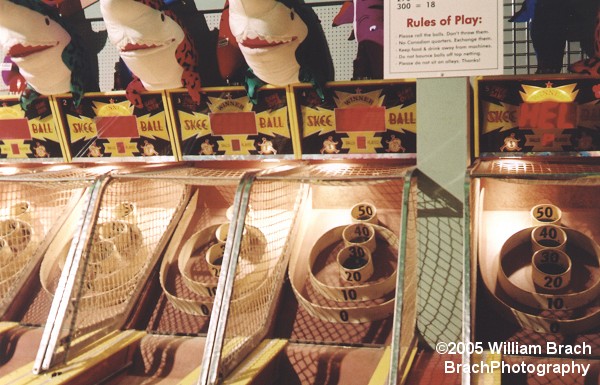 Skeeball games inside one of the arcade buildings.