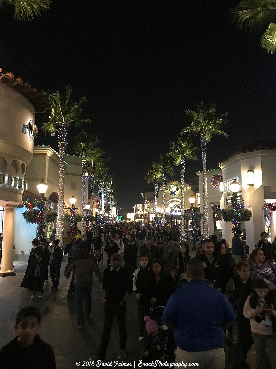 Beautifully lit up entrance area seen while exiting the park at night.